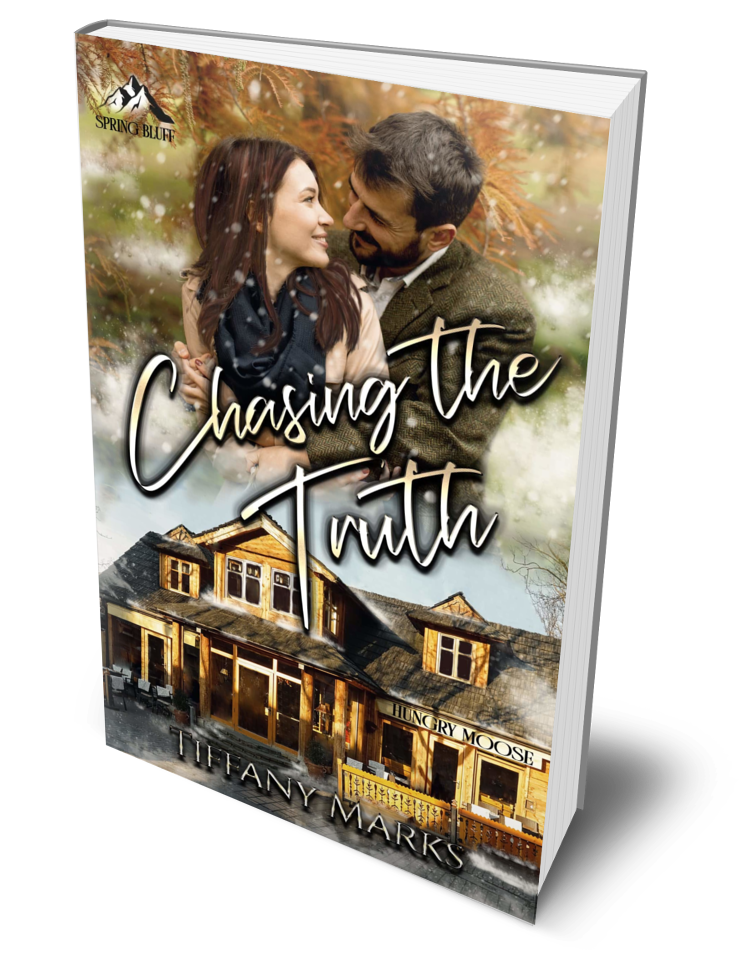 Chasing the Truth by Tiffany Marks. A cozy mountain restaurant glows warmly beneath falling snow as a couple wrapped in scarves share an intimate look. A small-town romantic suspense about trust, second chances, and uncovering buried truths.